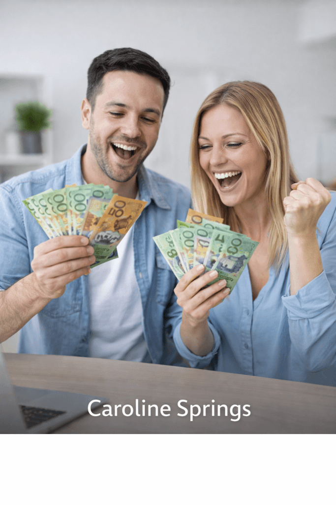 Happy Caroline Springs couple celebrating savings after getting their first home loan