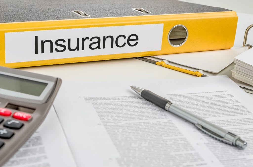 Building insurance document and pen for settlement checklist (Australia, 2025)