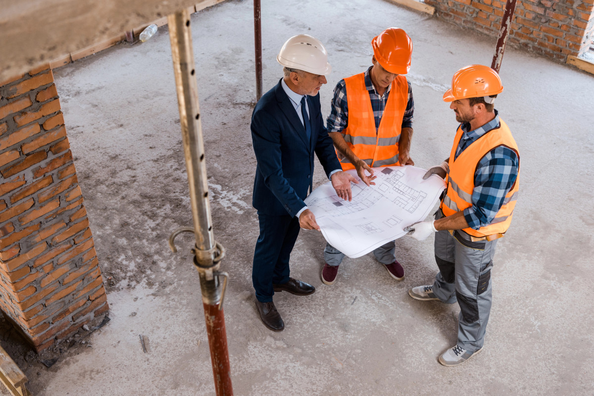 finance broker meeting on new commercial site